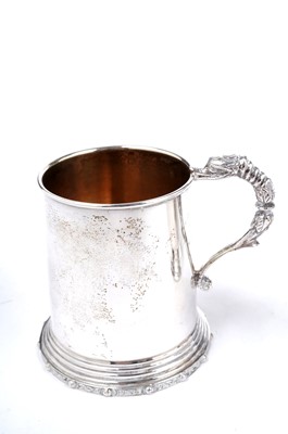 Lot 1352 - A pair of Elizabeth II and one other silver mugs