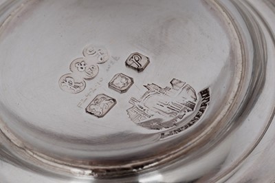 Lot 1352 - A pair of Elizabeth II and one other silver mugs