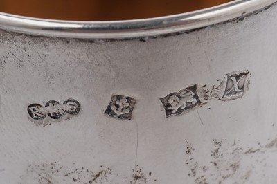 Lot 1352 - A pair of Elizabeth II and one other silver mugs
