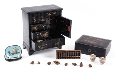 Lot 181 - A Japanese lacquered tabletop cabinet and a selection of Asian decorative items