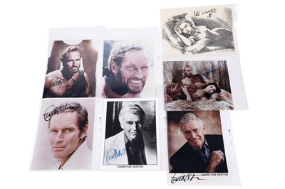 Lot 421 - A Kate Winslet signed photograph; and six Charlton Heston signed photographs