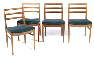 Lot 807 - A mid-20th Century Beithcraft Ltd drop leaf dining table; and chairs