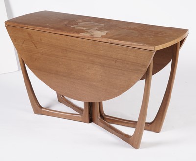 Lot 807 - A mid-20th Century Beithcraft Ltd drop leaf dining table; and chairs