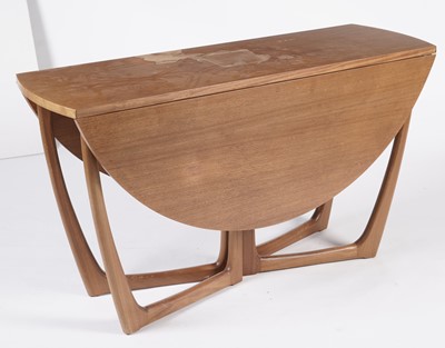 Lot 807 - A mid-20th Century Beithcraft Ltd drop leaf dining table; and chairs