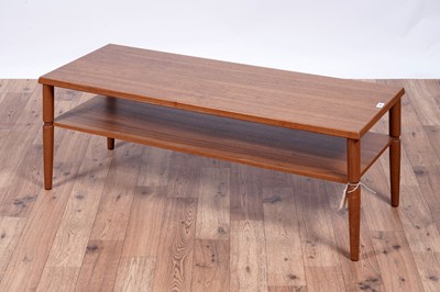 Lot 554 - A Mid Century teak coffee table