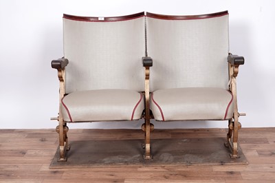 Lot 4 - A pair of early/mid-20th Century oak and cast metal cinema seats