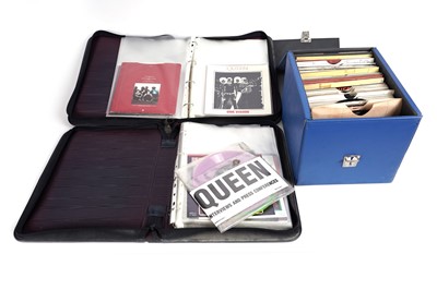 Lot 450 - A Queen collectors' bundle of 7" singles; and two folders of picture sleeves