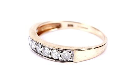 Lot 213 - A diamond half hoop eternity ring