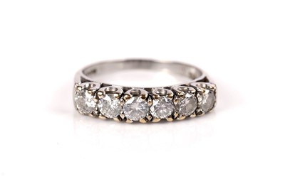 Lot 1090 - A six stone diamond ring