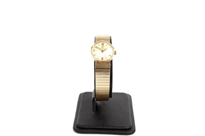 Lot 1013 - Omega: a lady's 9ct yellow gold cased cocktail watch