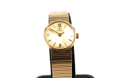 Lot 1013 - Omega: a lady's 9ct yellow gold cased cocktail watch