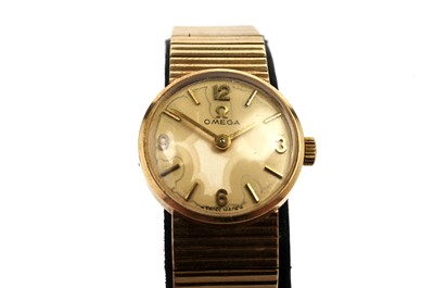 Lot 1013 - Omega: a lady's 9ct yellow gold cased cocktail watch