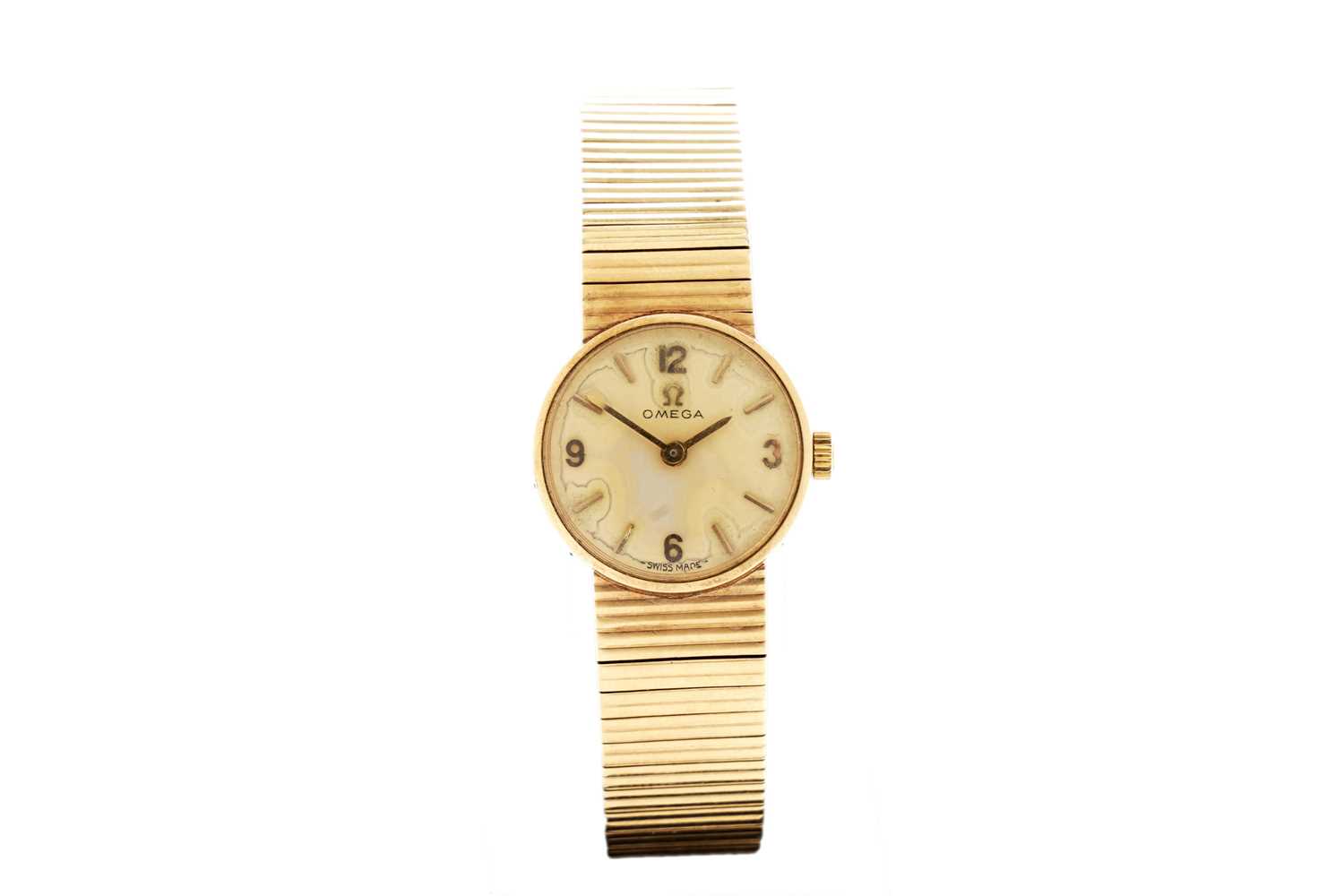 Lot 1013 - Omega: a lady's 9ct yellow gold cased cocktail watch