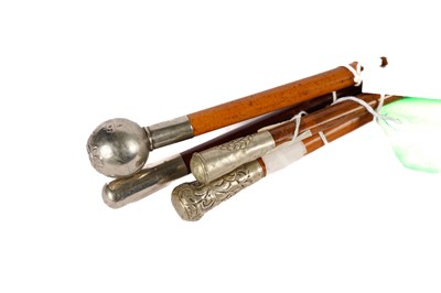 Lot 1015 - Four swagger sticks