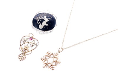 Lot 617 - A snowflake pendant; an Edwardian pendant; and a silver brooch