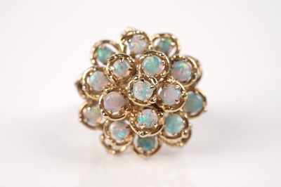 Lot 1097 - An opal cluster ring