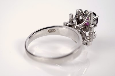 Lot 39 - A ruby and diamond cluster ring