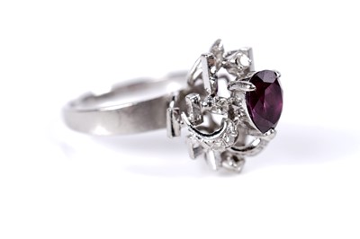 Lot 39 - A ruby and diamond cluster ring