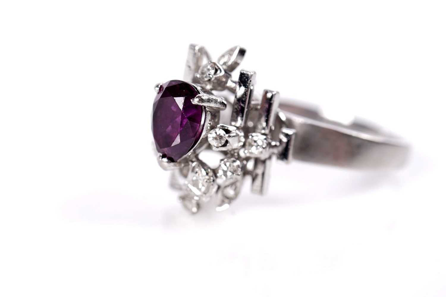 Lot 39 - A ruby and diamond cluster ring