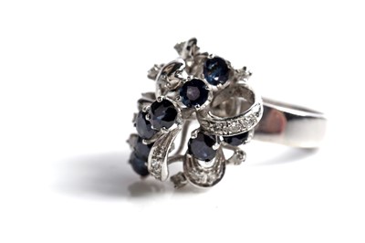 Lot 45 - A sapphire and diamond dress ring