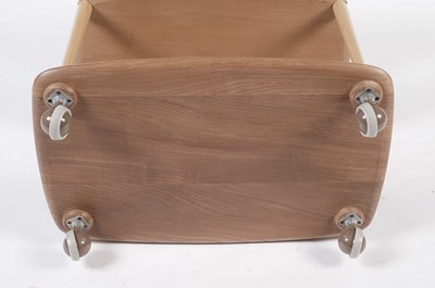 Lot 832 - An Ercol elm ‘Windsor’ model 458 three tier drinks trolley