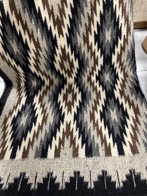 Lot 713 - Three Navajo rugs