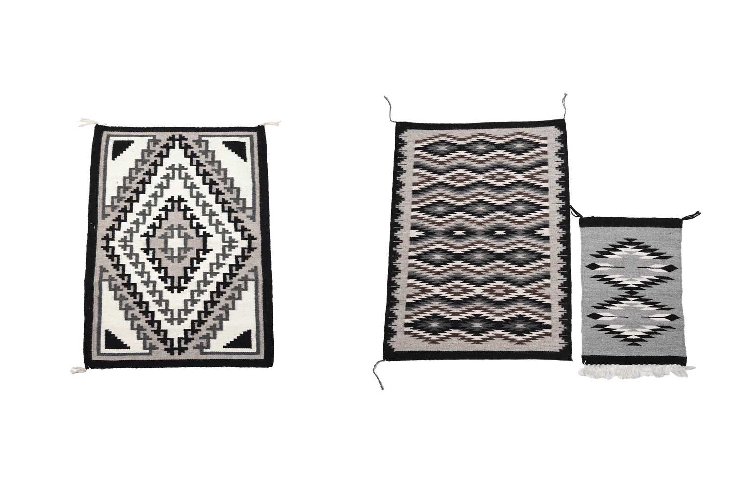 Lot 713 - Three Navajo rugs