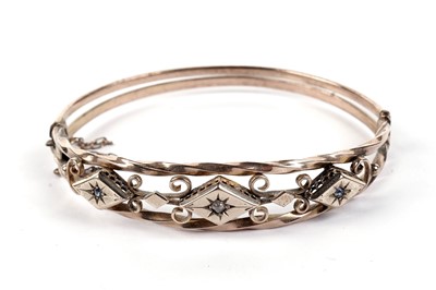 Lot 488 - A gold, sapphire, and diamond bangle
