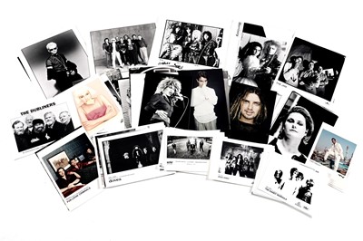 Lot 1406 - Record label promotional black and white and colour photographs of bands and musicians