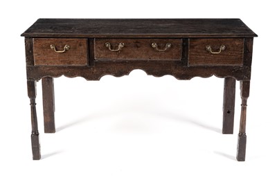 Lot 70 - A George III oak dresser base
