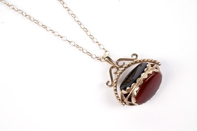 Lot 682 - A 9ct gold mounted onyx, bloodstone, and carnelian swivel fob