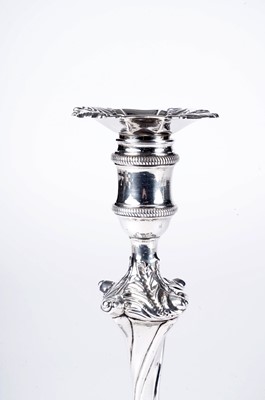 Lot 1531 - A pair of early George III cast silver candlesticks
