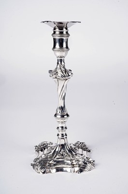 Lot 1531 - A pair of early George III cast silver candlesticks