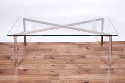 Lot 12 - A Barcelona style chrome and glass coffee table