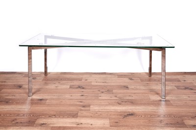 Lot 12 - A Barcelona style chrome and glass coffee table