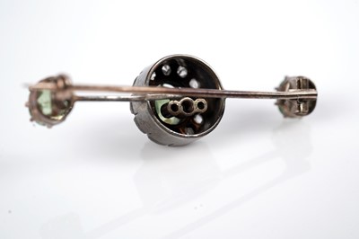 Lot 1117 - A Victorian peridot and diamond cluster bar brooch