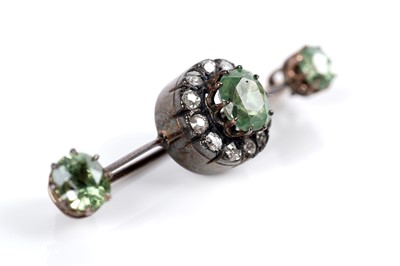 Lot 1117 - A Victorian peridot and diamond cluster bar brooch