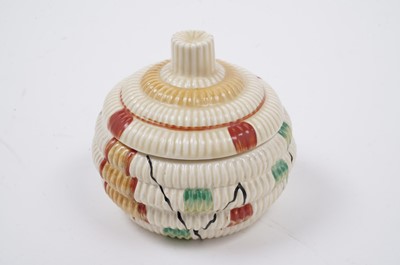 Lot 522 - A Clarice Cliff ‘Raffia Indiana’ pattern sugar bowl and lid