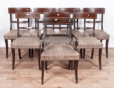 Lot 60 - A set of eight Regency mahogany and satinwood banded dining chairs