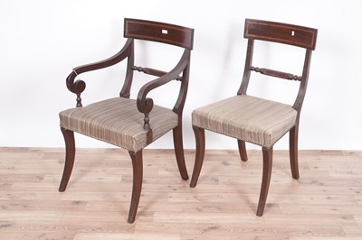 Lot 60 - A set of eight Regency mahogany and satinwood banded dining chairs