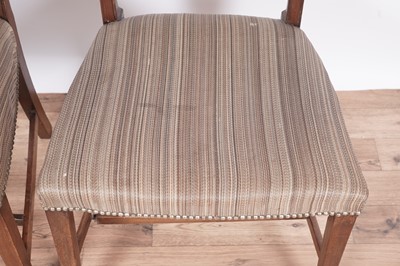 Lot 60 - A set of eight Regency mahogany and satinwood banded dining chairs
