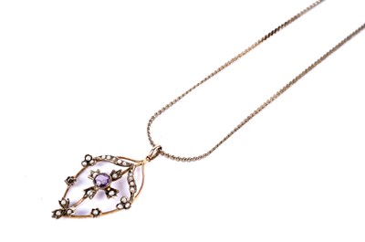 Lot 29 - An Edwardian amethyst and seed pearl pendant
