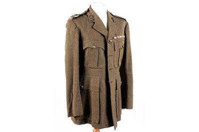 Lot 252 - A Second World War Royal Artillery Officers service dress jacket; and other itms