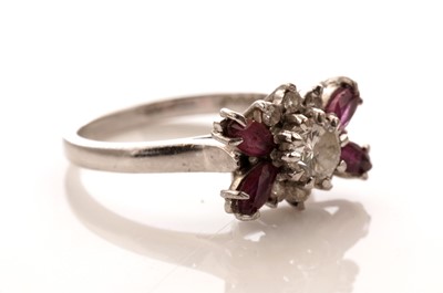 Lot 34 - An Art Deco style diamond and ruby dress ring
