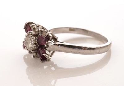 Lot 34 - An Art Deco style diamond and ruby dress ring
