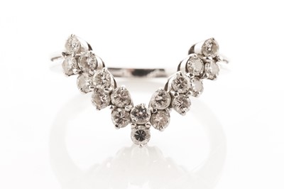 Lot 36 - A diamond wishbone shaped band