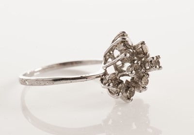 Lot 42 - A diamond five-stone ring; and a cluster dress ring