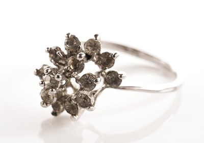 Lot 42 - A diamond five-stone ring; and a cluster dress ring