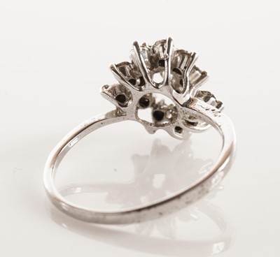 Lot 42 - A diamond five-stone ring; and a cluster dress ring
