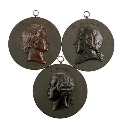 Lot 175 - Eight mid-19th Century French Bois Durci medallions